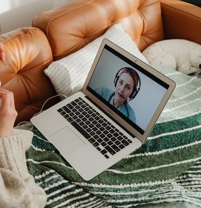 Patient on a video consultation with a doctor from home